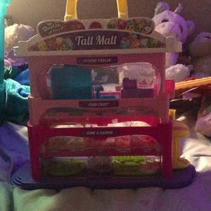 Pink three-story shop kin mall